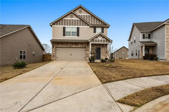 a front view of house with yard
