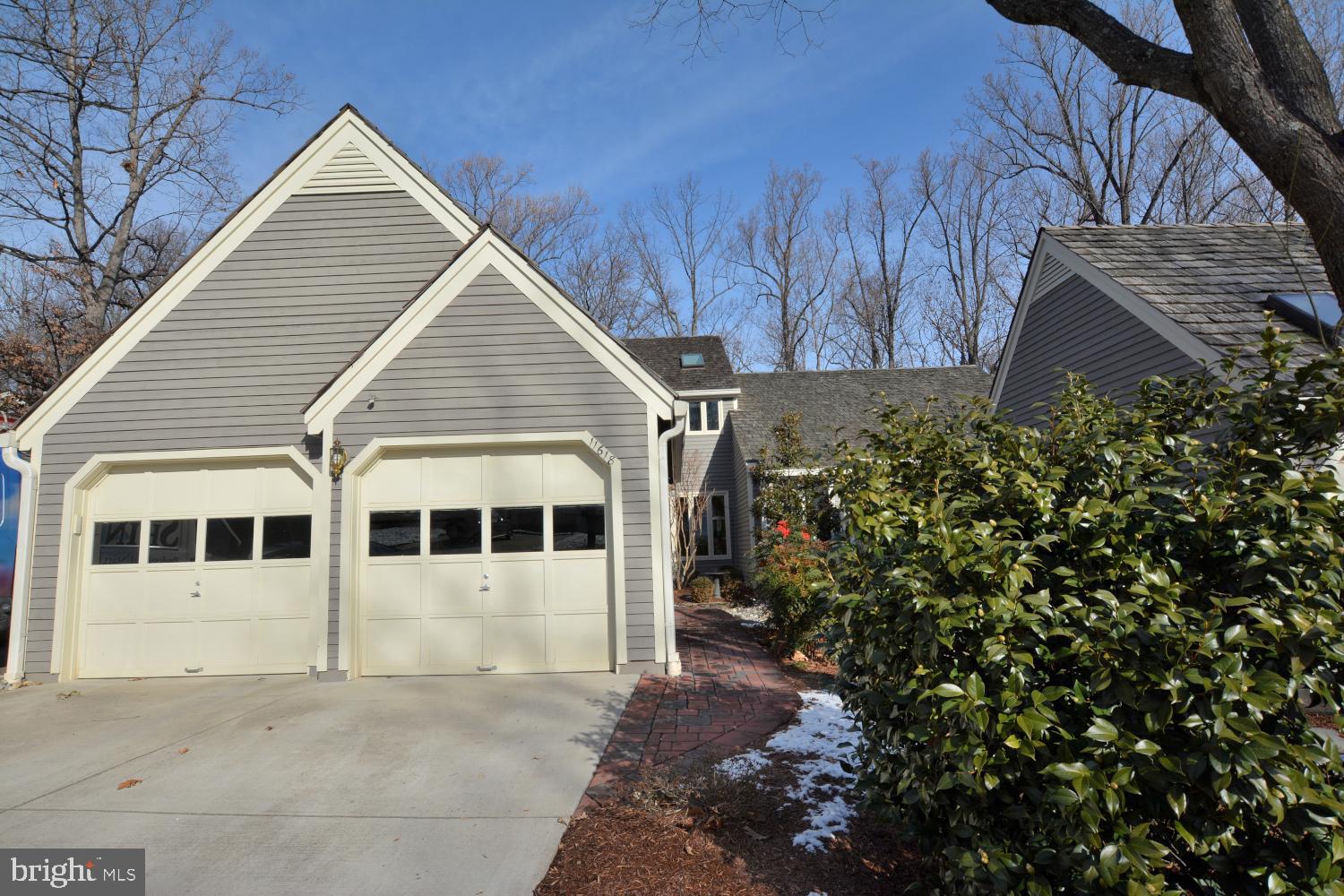 11618 Chapel Cross Way Reston, VA 20194 - Photo 2 of 41 Two car garage with expansive attic storage