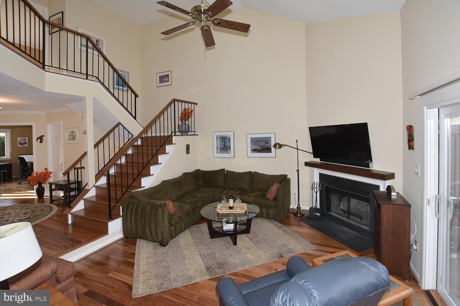 11618 Chapel Cross Way Reston, VA 20194 - Photo 7 of 41 Cozy fireplace with wiring for mounting TV