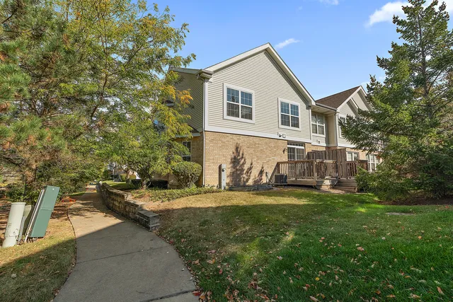 a view of a house with a tree