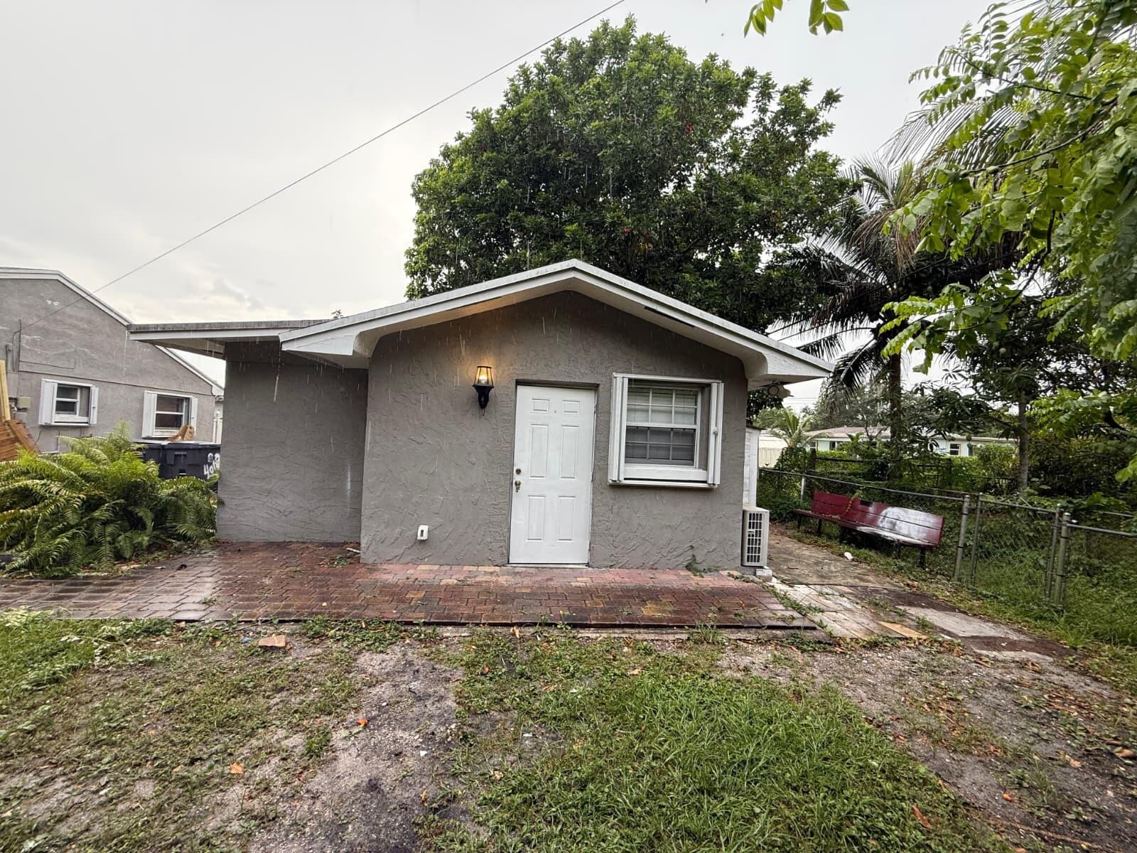 4061 Belle Road Lake Worth, FL 33461 - Photo 1 of 2 FRONT