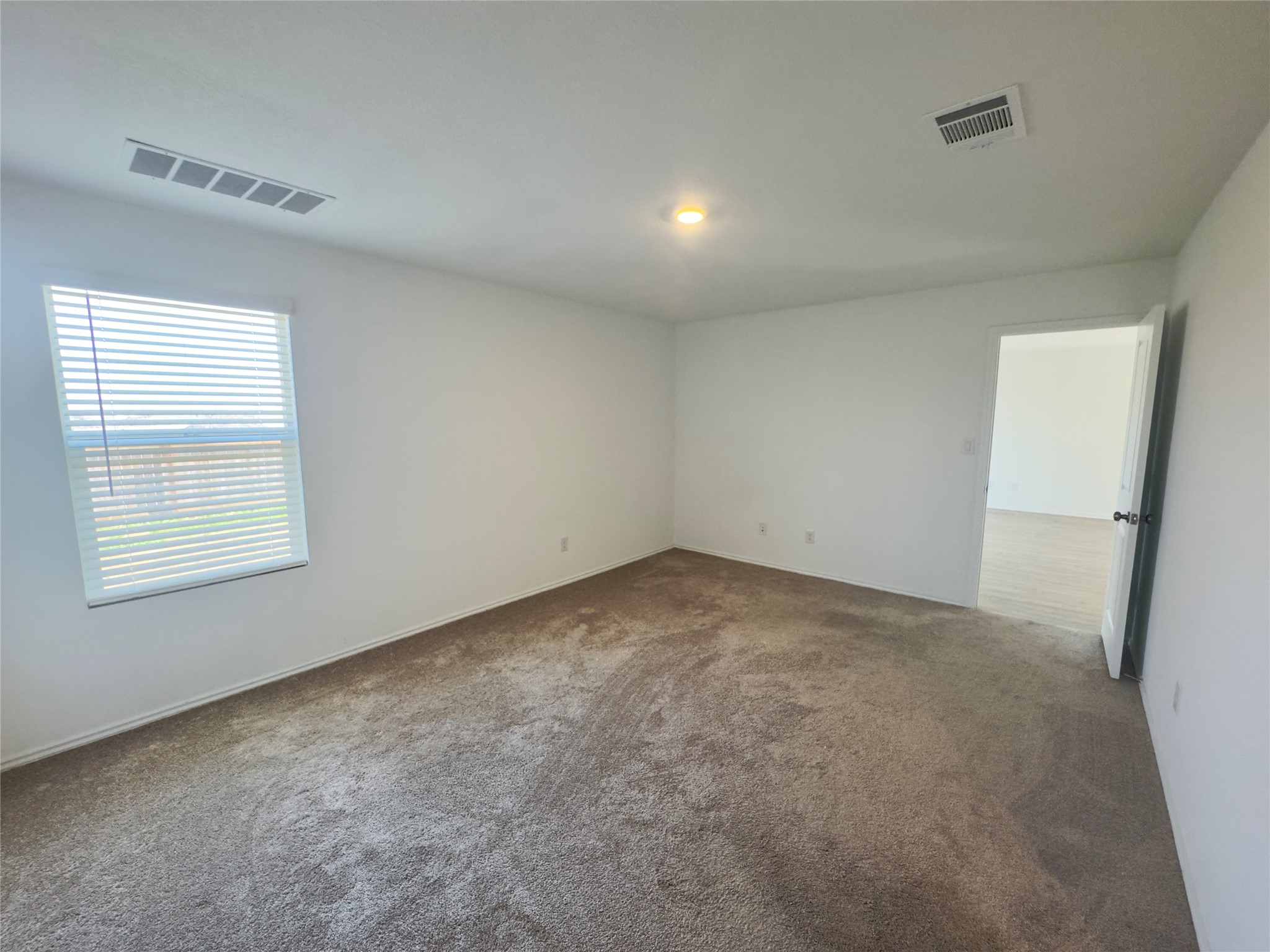 2218 Cumulus Court Lockhart, TX 78644 - Photo 19 of 35 an empty room with a window