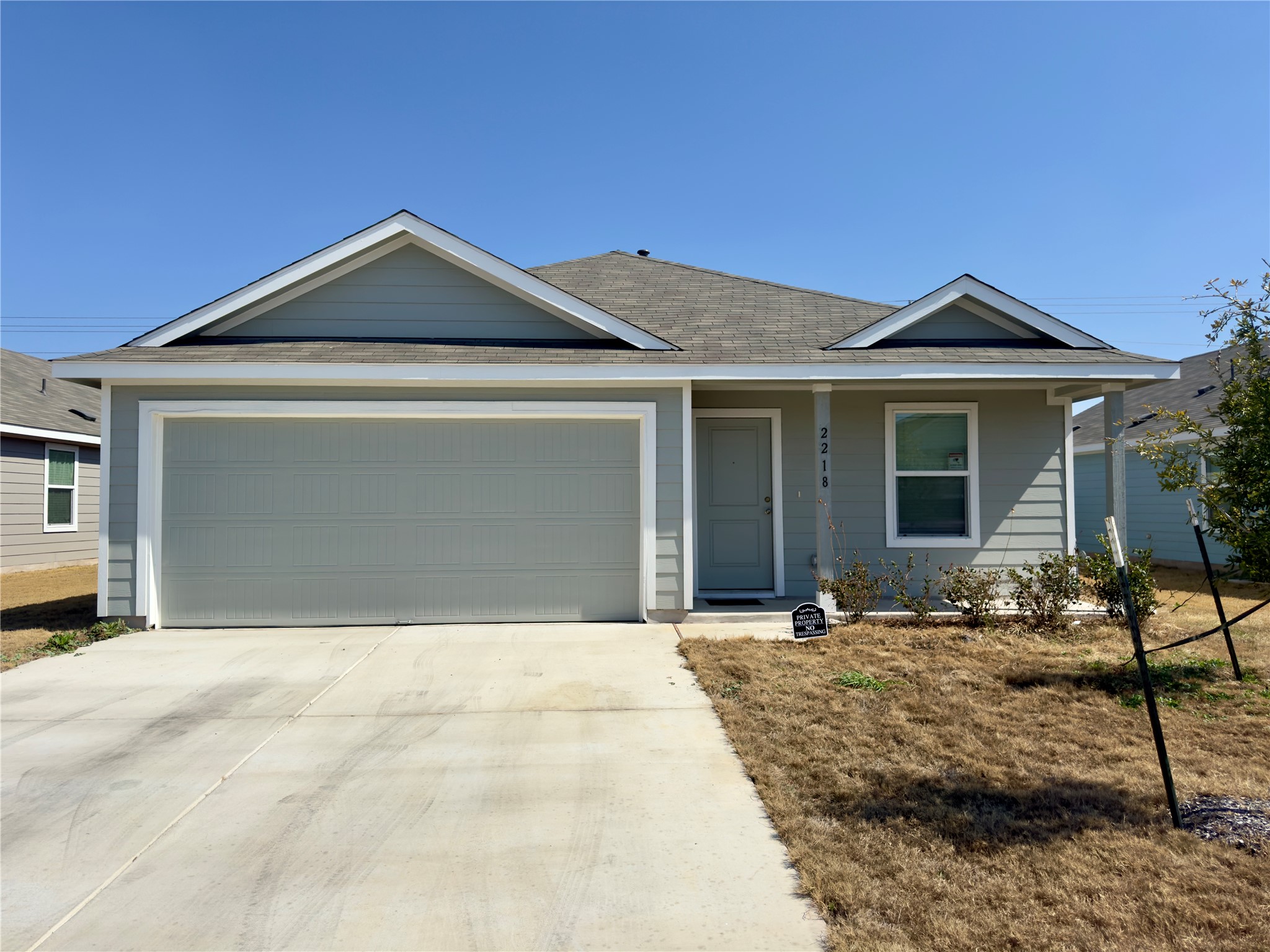 2218 Cumulus Court Lockhart, TX 78644 - Photo 2 of 35 a front view of a house with yard