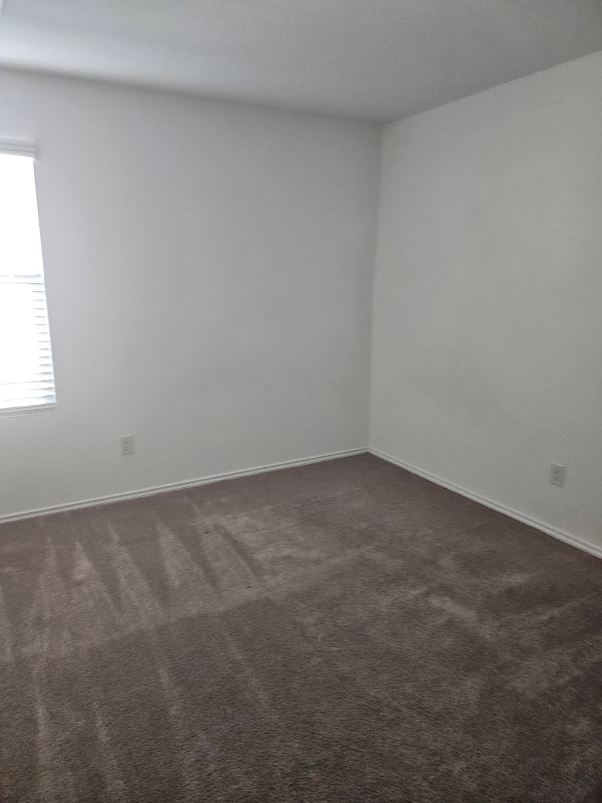 2218 Cumulus Court Lockhart, TX 78644 - Photo 22 of 35 an empty room with a window