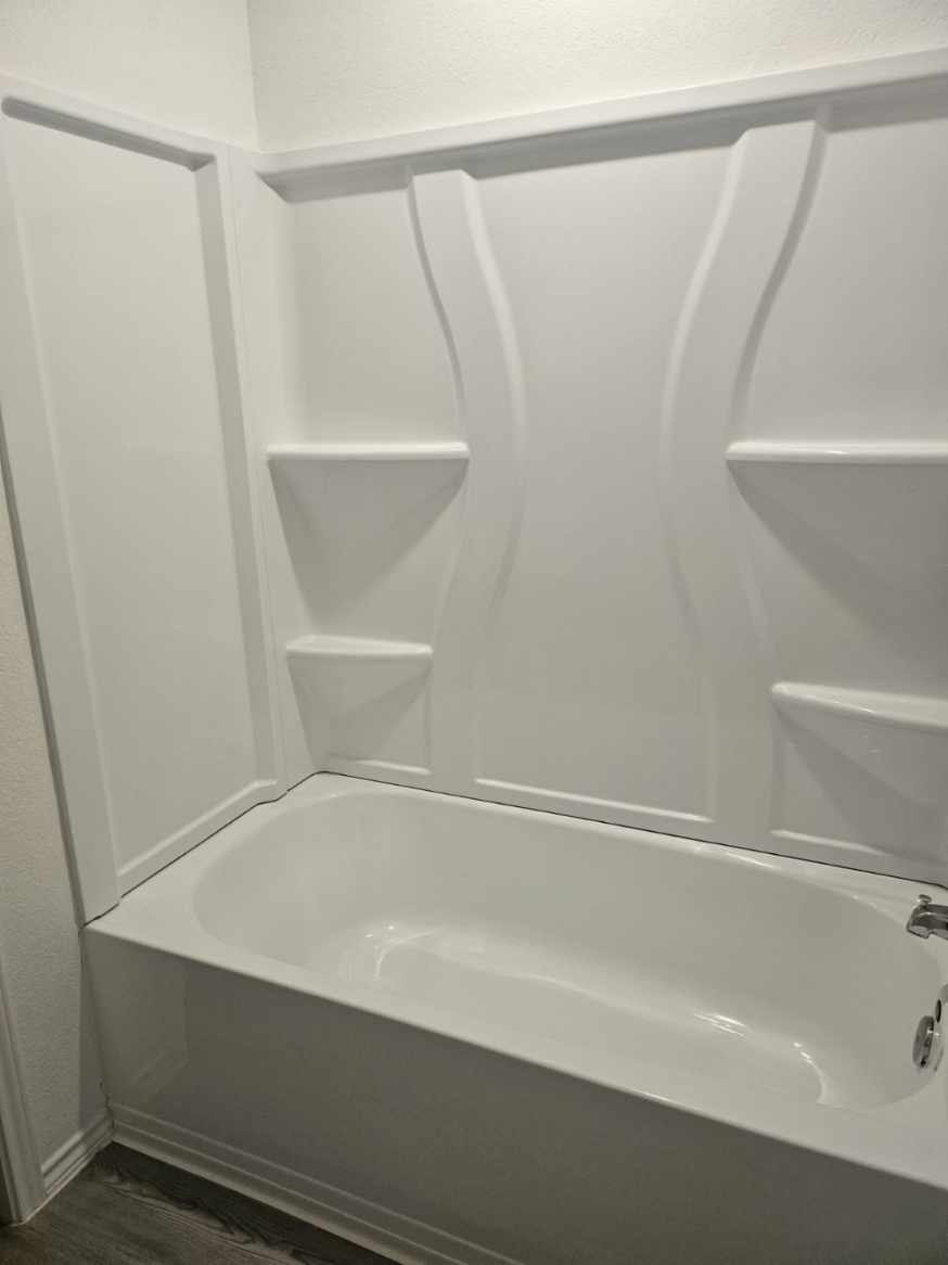 2218 Cumulus Court Lockhart, TX 78644 - Photo 24 of 35 a bathroom with a bathtub
