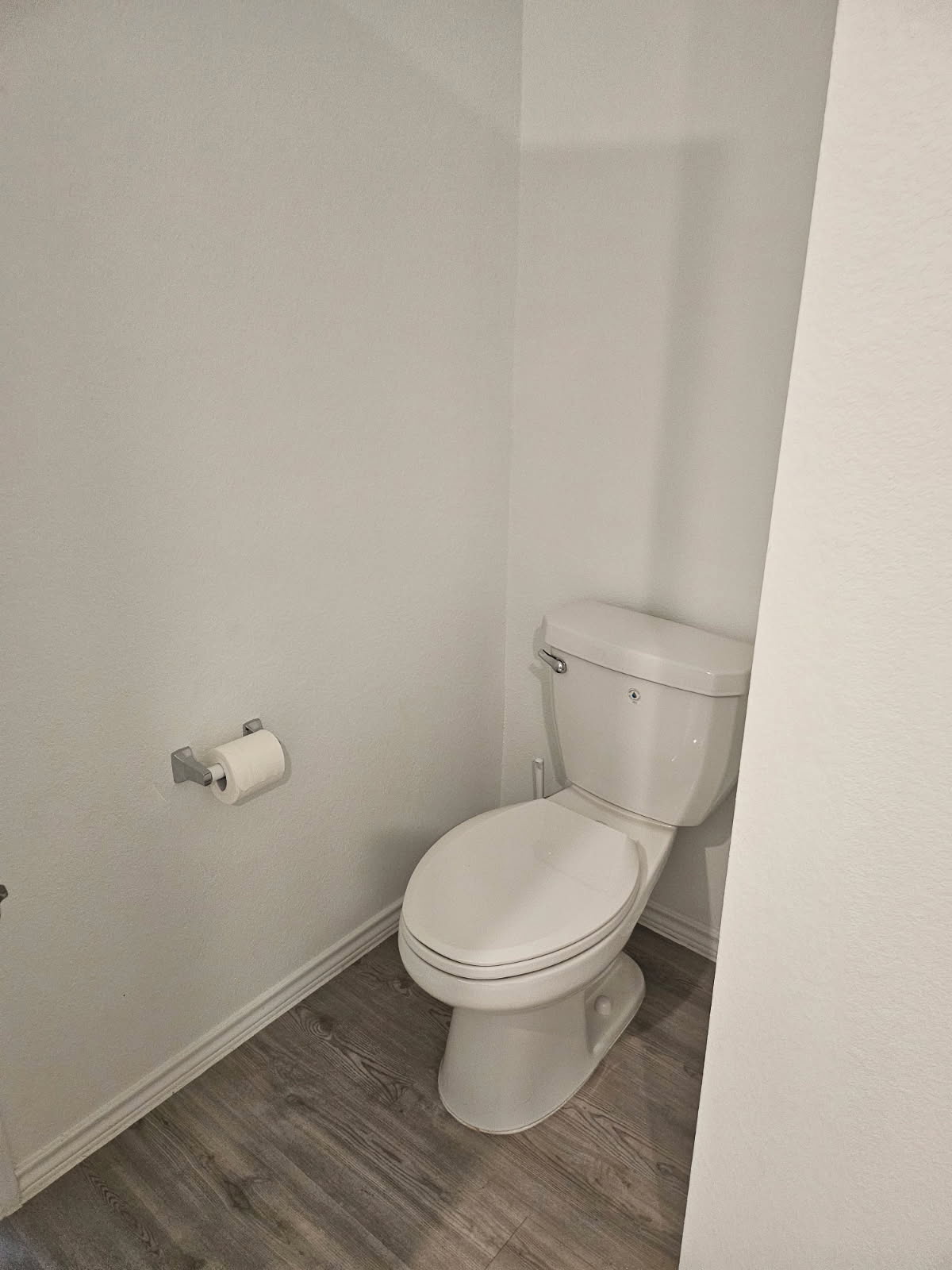 2218 Cumulus Court Lockhart, TX 78644 - Photo 25 of 35 a white toilet sitting next to a shower