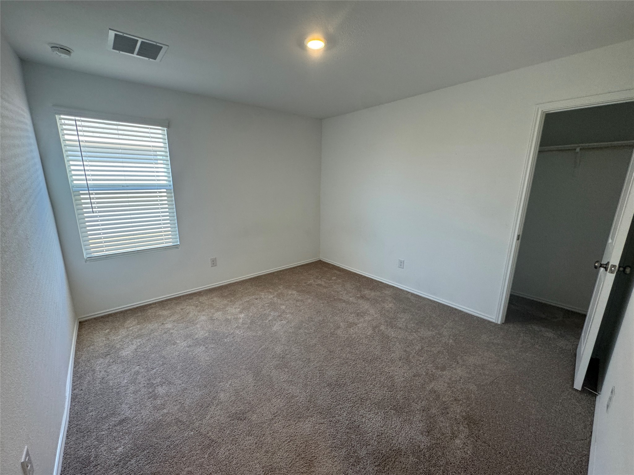 2218 Cumulus Court Lockhart, TX 78644 - Photo 26 of 35 an empty room with windows