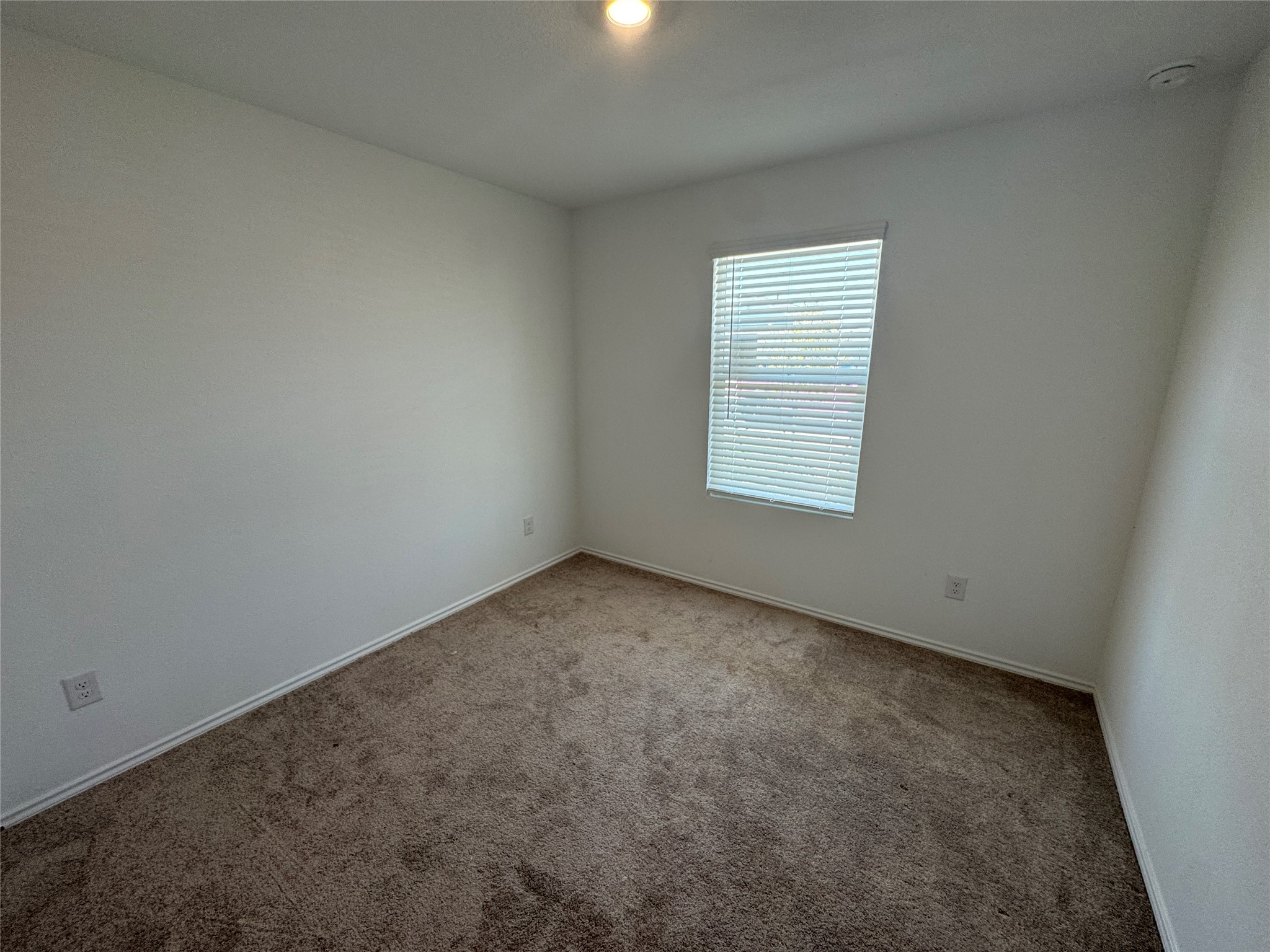 2218 Cumulus Court Lockhart, TX 78644 - Photo 28 of 35 an empty room with a window