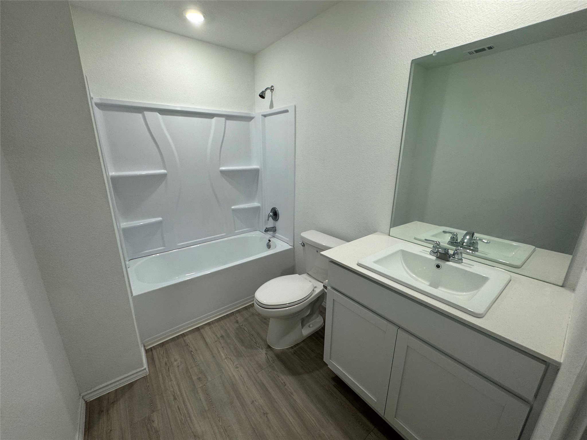 2218 Cumulus Court Lockhart, TX 78644 - Photo 29 of 35 a bathroom with a sink toilet and shower