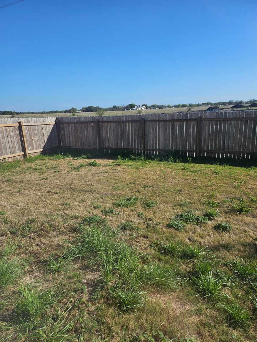 2218 Cumulus Court Lockhart, TX 78644 - Photo 35 of 35 a backyard of a house