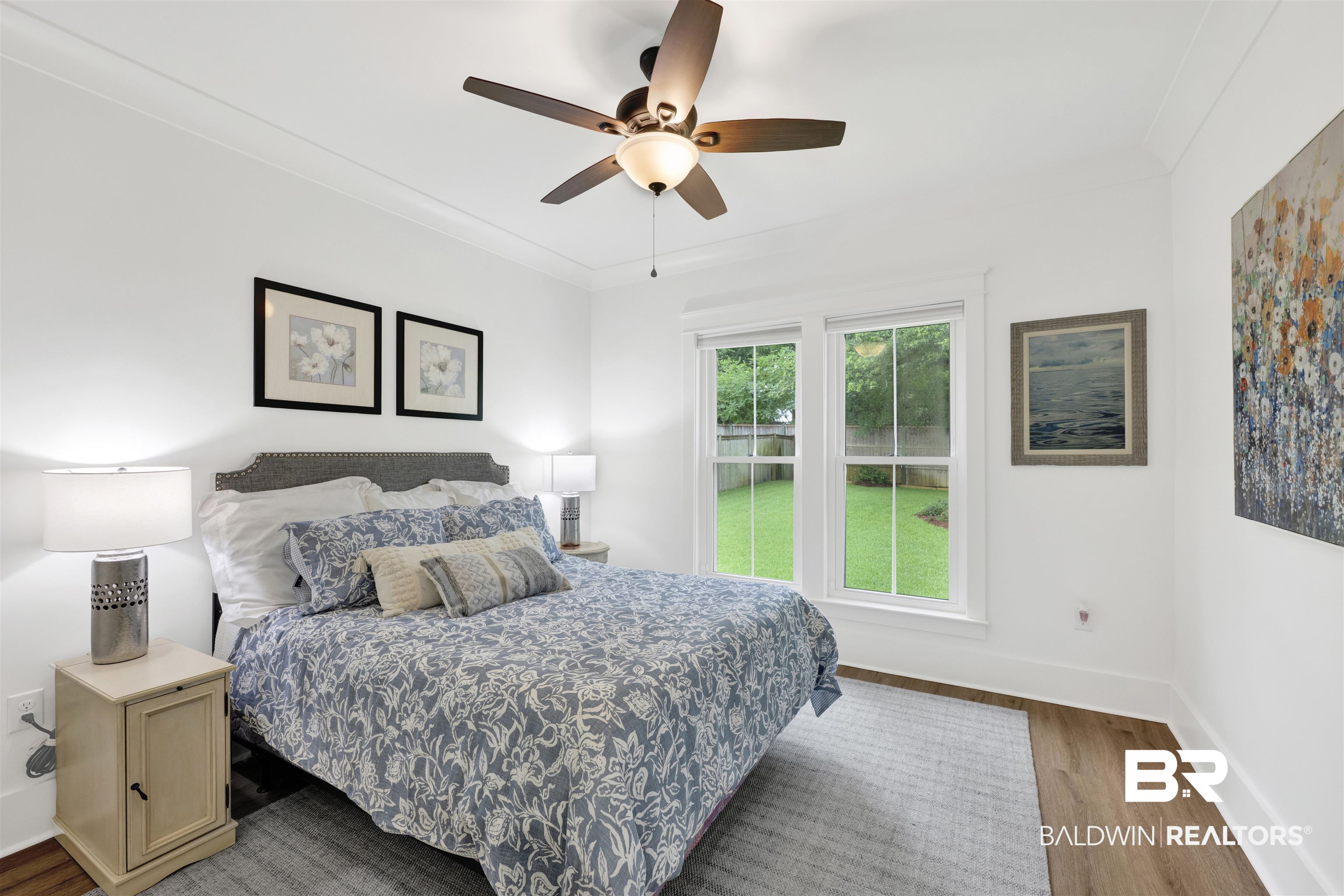 21702 Pillars Street Fairhope, AL 36532 - Photo 30 of 54 Bright interior space featuring wood-finish flooring and crown molding