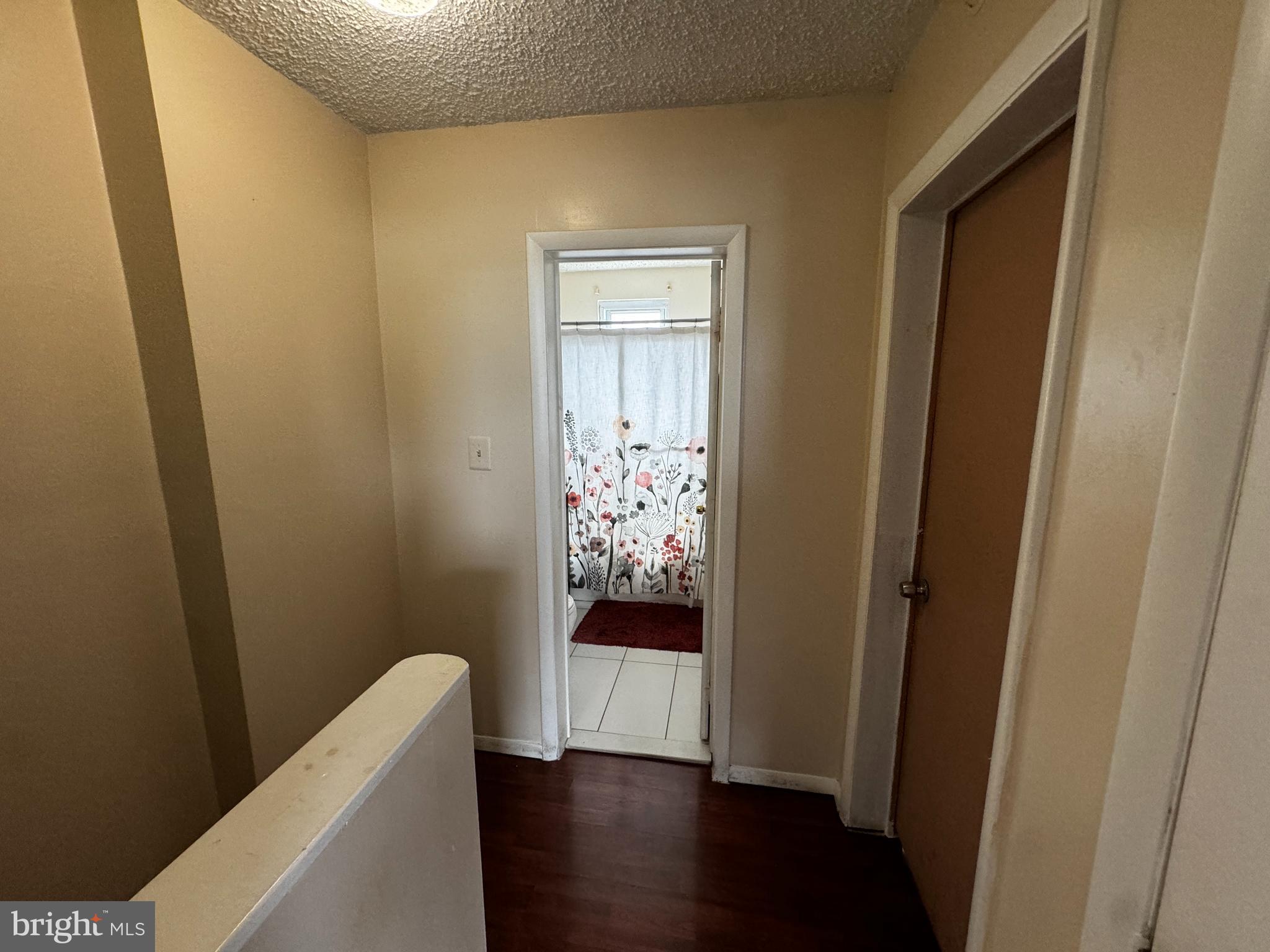 1059 Bunbury Way Baltimore, MD 21205 - Photo 7 of 18 a view of bathroom with tub and wooden floor