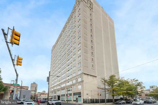 a view of a city with tall buildings