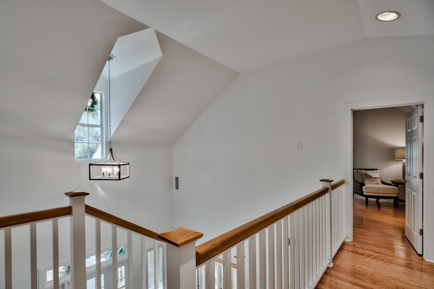 149 East Grove Avenue Santa Rosa Beach, FL 32459 - Photo 13 of 42 a view of a hallway view with staircase