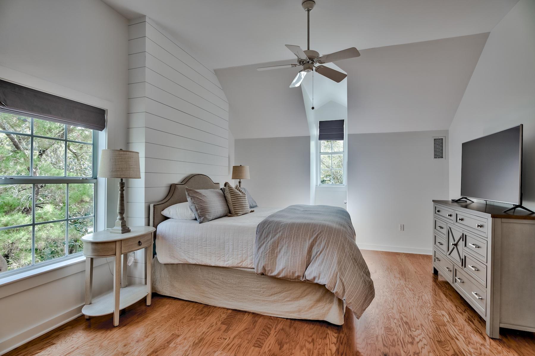 149 East Grove Avenue Santa Rosa Beach, FL 32459 - Photo 17 of 42 a living room with furniture and a flat screen tv