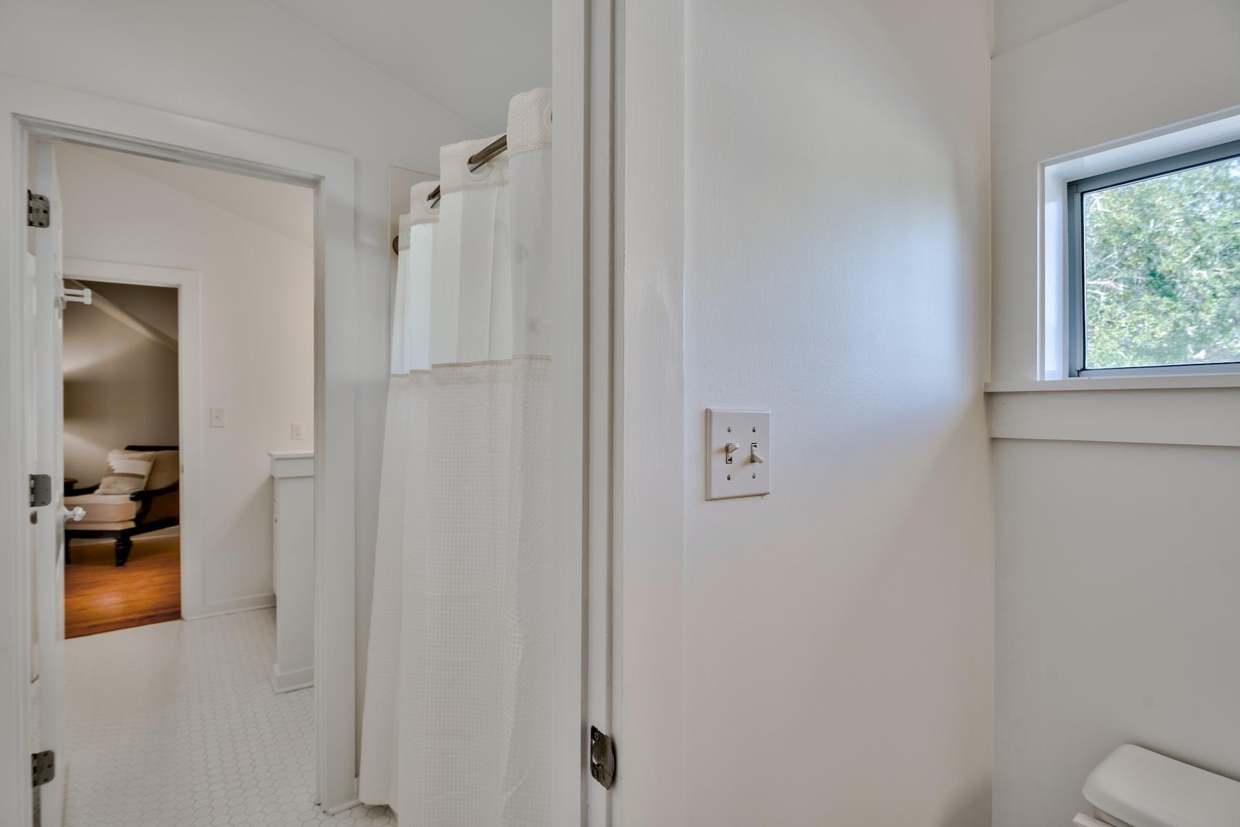 149 East Grove Avenue Santa Rosa Beach, FL 32459 - Photo 26 of 42 a bathroom with a shower and toilet