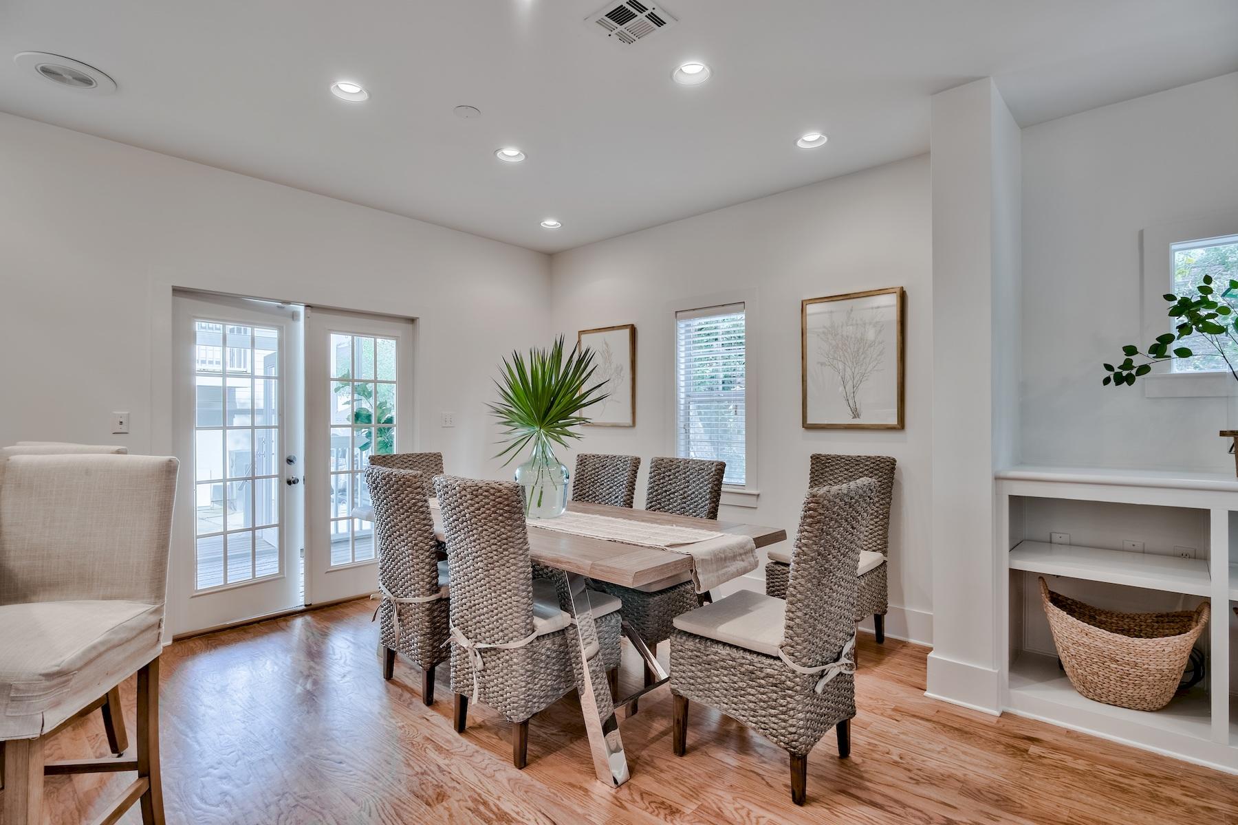 149 East Grove Avenue Santa Rosa Beach, FL 32459 - Photo 3 of 42 a dining room with furniture and wooden floor