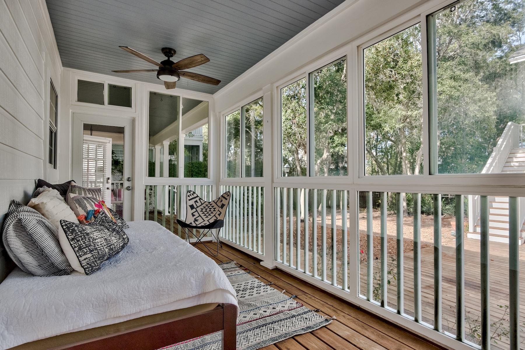 149 East Grove Avenue Santa Rosa Beach, FL 32459 - Photo 31 of 42 a bedroom with furniture and a large window