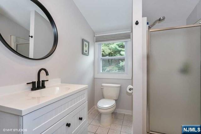 24 Robinhood Avenue Closter, NJ 07624 - Photo 13 of 20 a bathroom with a toilet a sink and a mirror