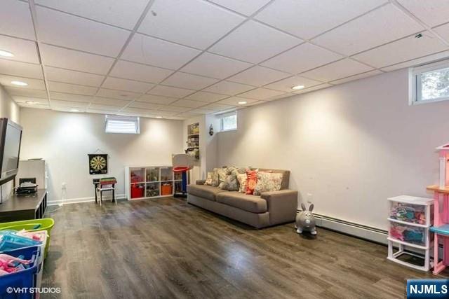 24 Robinhood Avenue Closter, NJ 07624 - Photo 14 of 20 a living room with furniture and a wooden floor