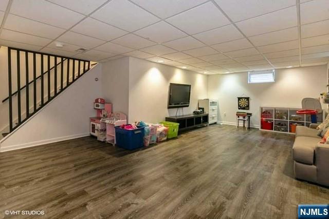 24 Robinhood Avenue Closter, NJ 07624 - Photo 15 of 20 a living room with furniture and a flat screen tv