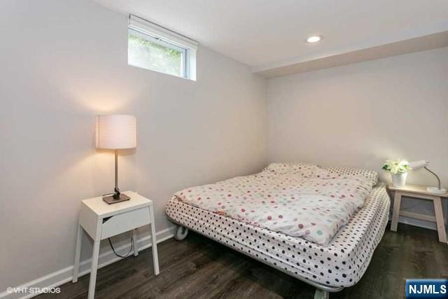 24 Robinhood Avenue Closter, NJ 07624 - Photo 17 of 20 a bedroom with bed and a window