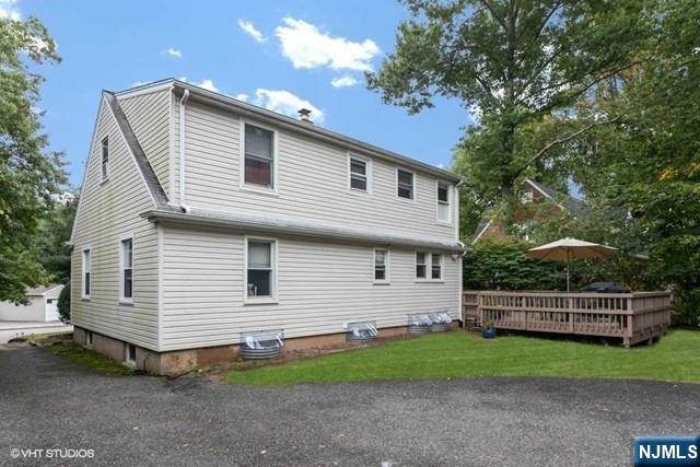 24 Robinhood Avenue Closter, NJ 07624 - Photo 19 of 20 a front view of a house with garage