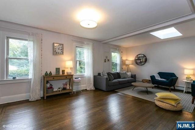 24 Robinhood Avenue Closter, NJ 07624 - Photo 3 of 20 a living room with furniture and a window