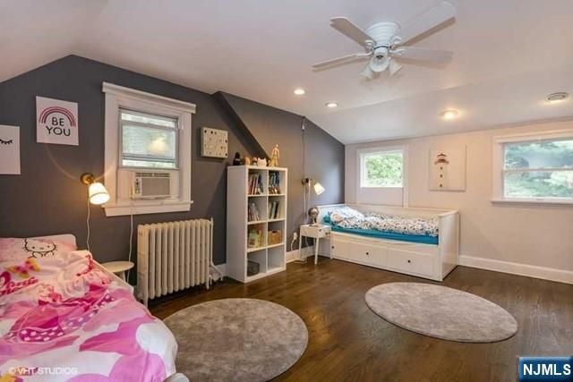 24 Robinhood Avenue Closter, NJ 07624 - Photo 9 of 20 a bedroom with furniture and a window