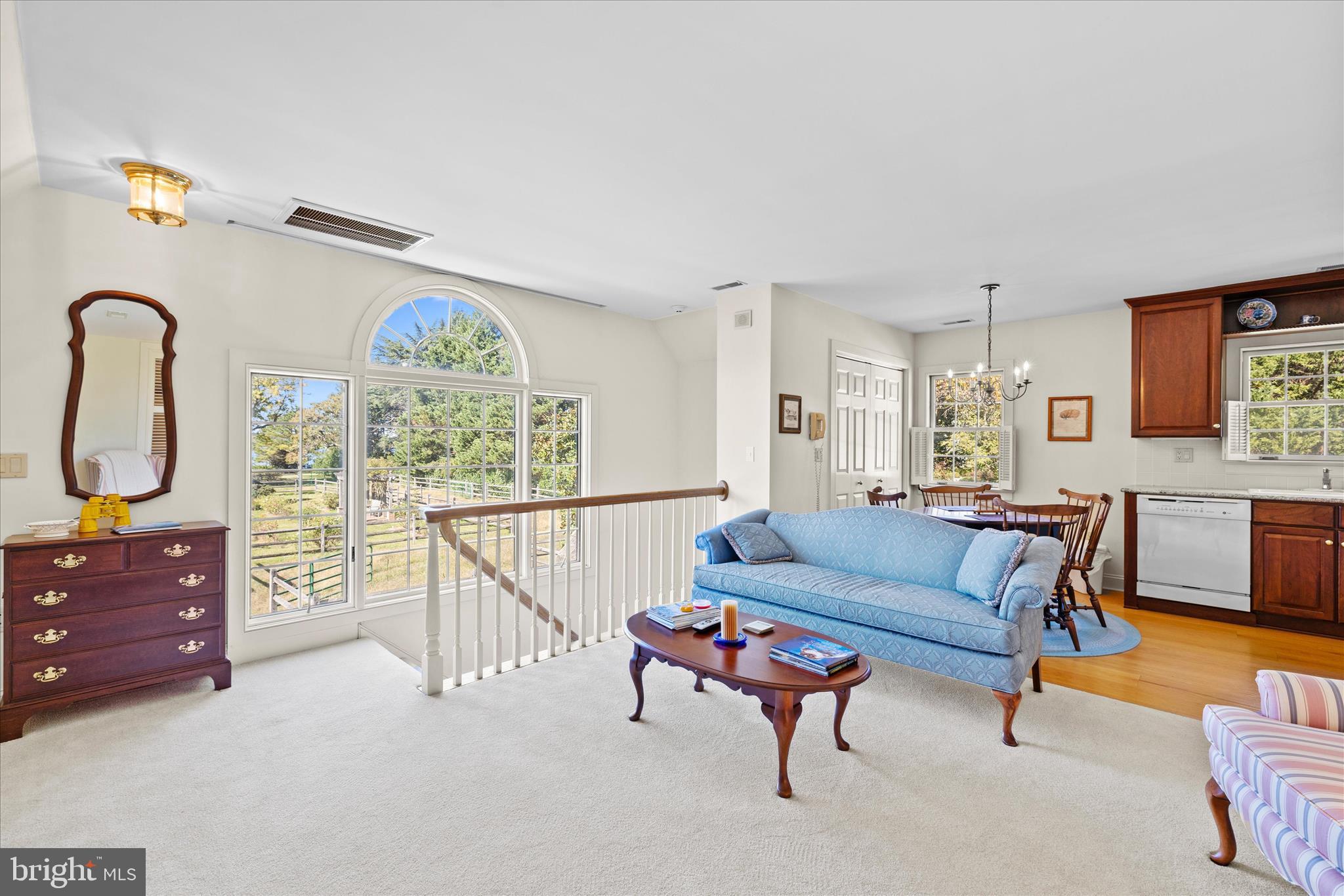 27473 Westpoint Road Easton, MD 21601 - Photo 49 of 58 a living room with furniture and a large window