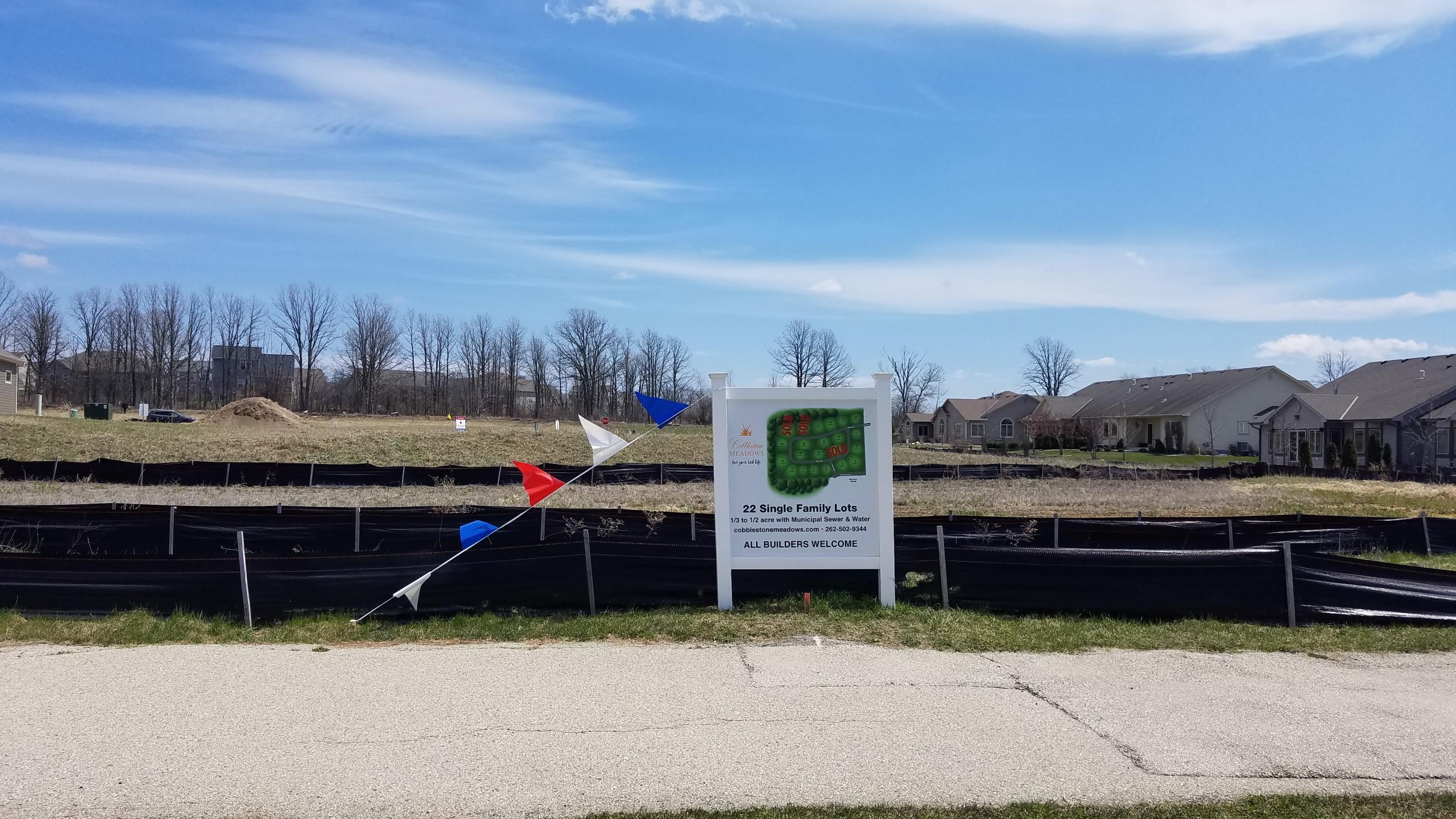 W208N16295 Renee Way, Unit LT4 Jackson, WI 53037 - Photo 6 of 6 Cobblestone Meadows Sales Sign