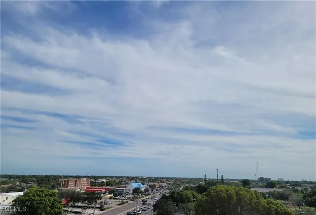 a view of an entryway with a floor to ceiling window