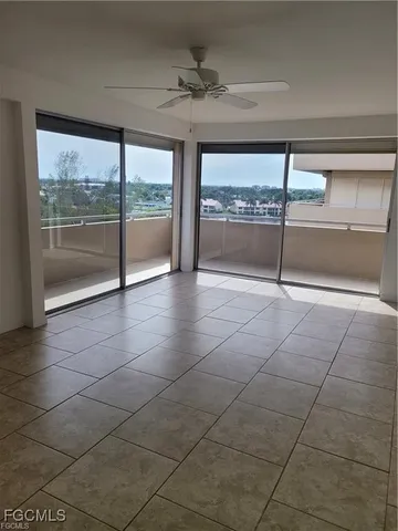 a kitchen that has a sink and a stove