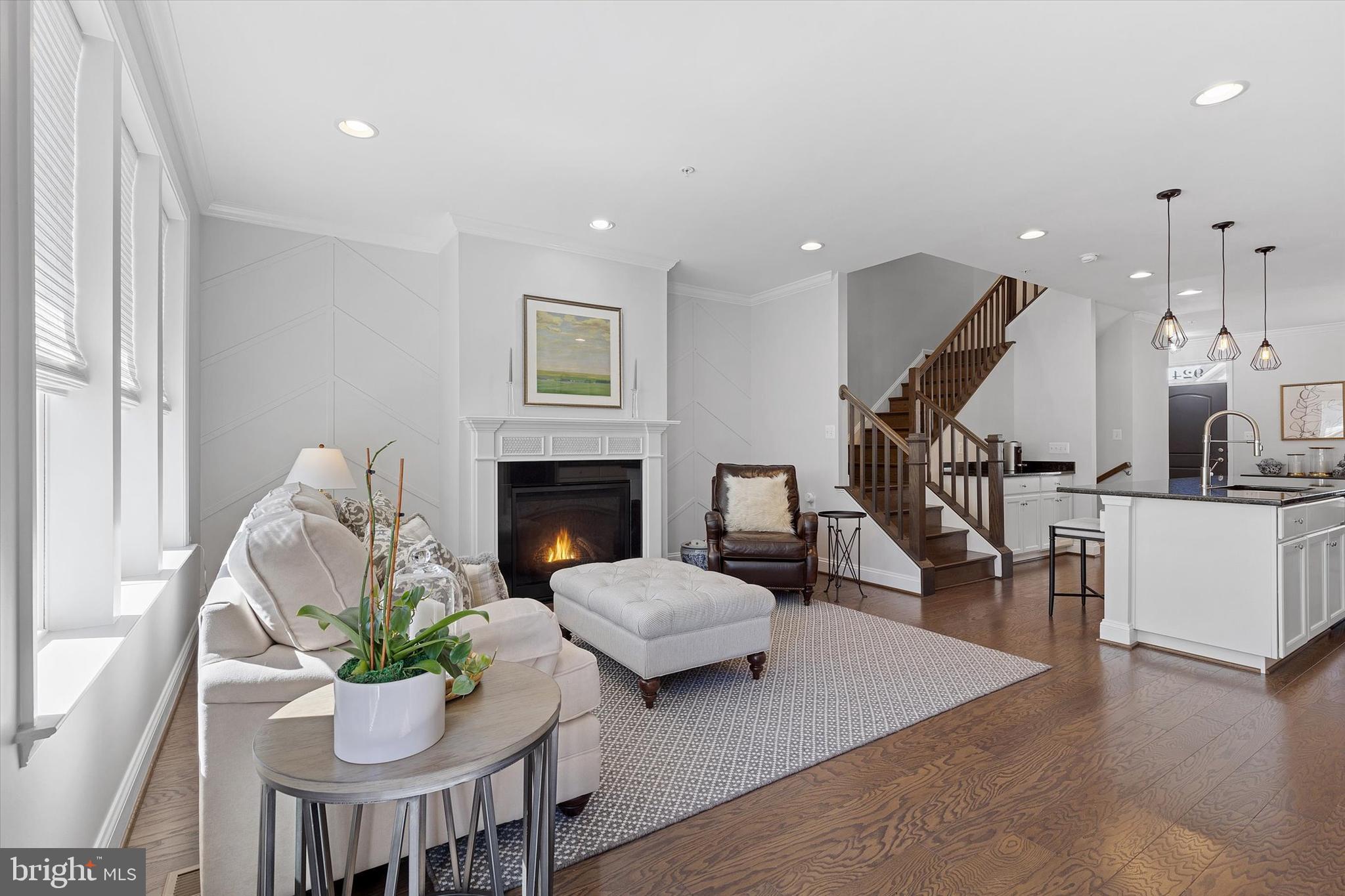 924 Lindley Road Frederick, MD 21701 - Photo 11 of 46 a living room with furniture and a fireplace