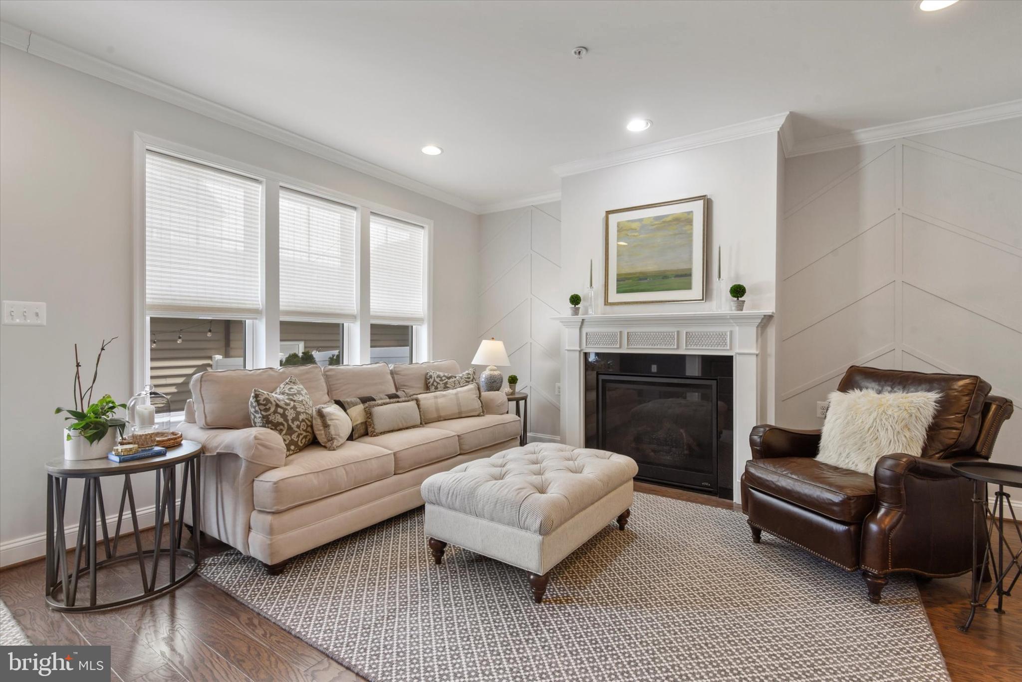 924 Lindley Road Frederick, MD 21701 - Photo 12 of 46 a living room with furniture and a fireplace