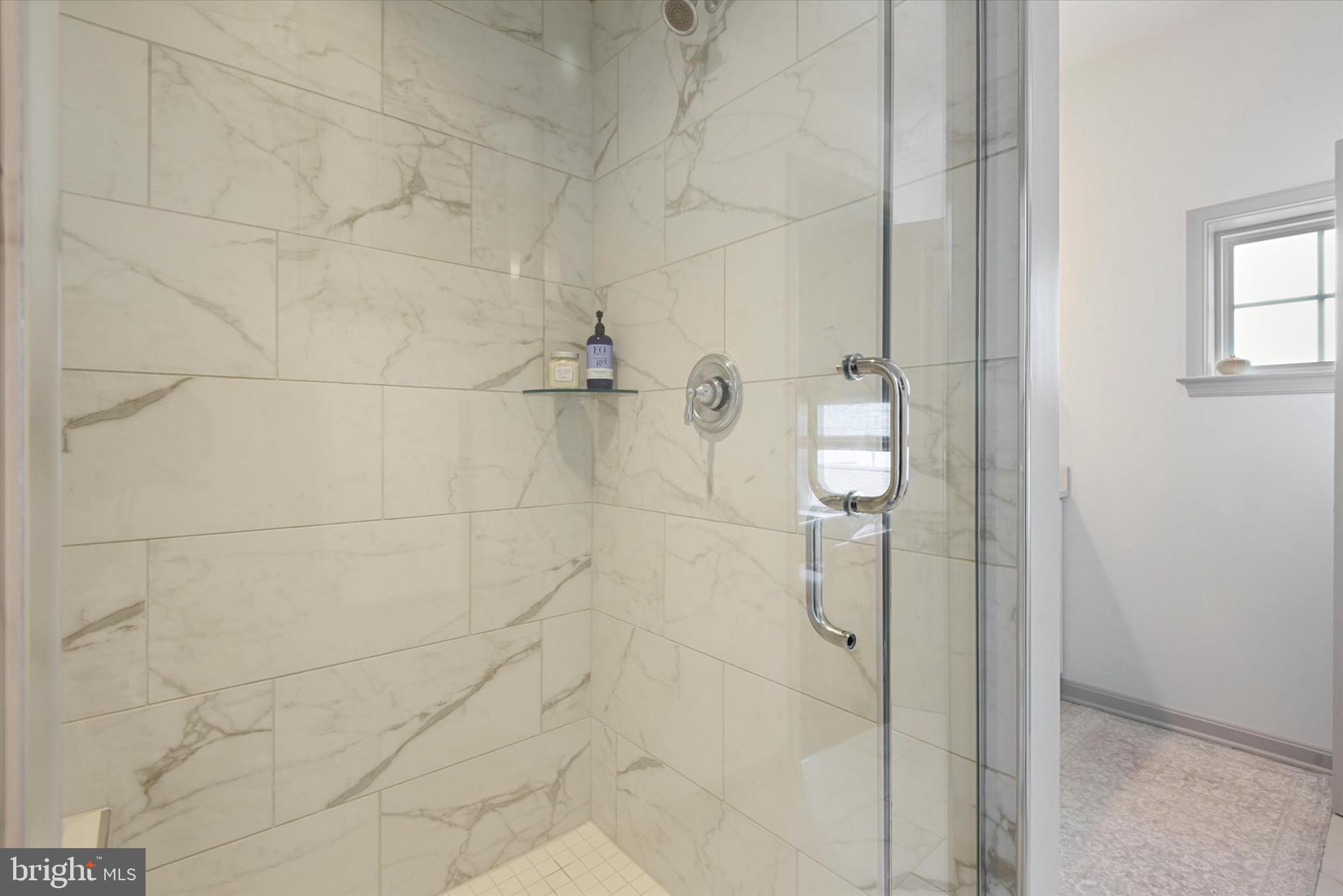 924 Lindley Road Frederick, MD 21701 - Photo 19 of 46 a bathroom with a shower