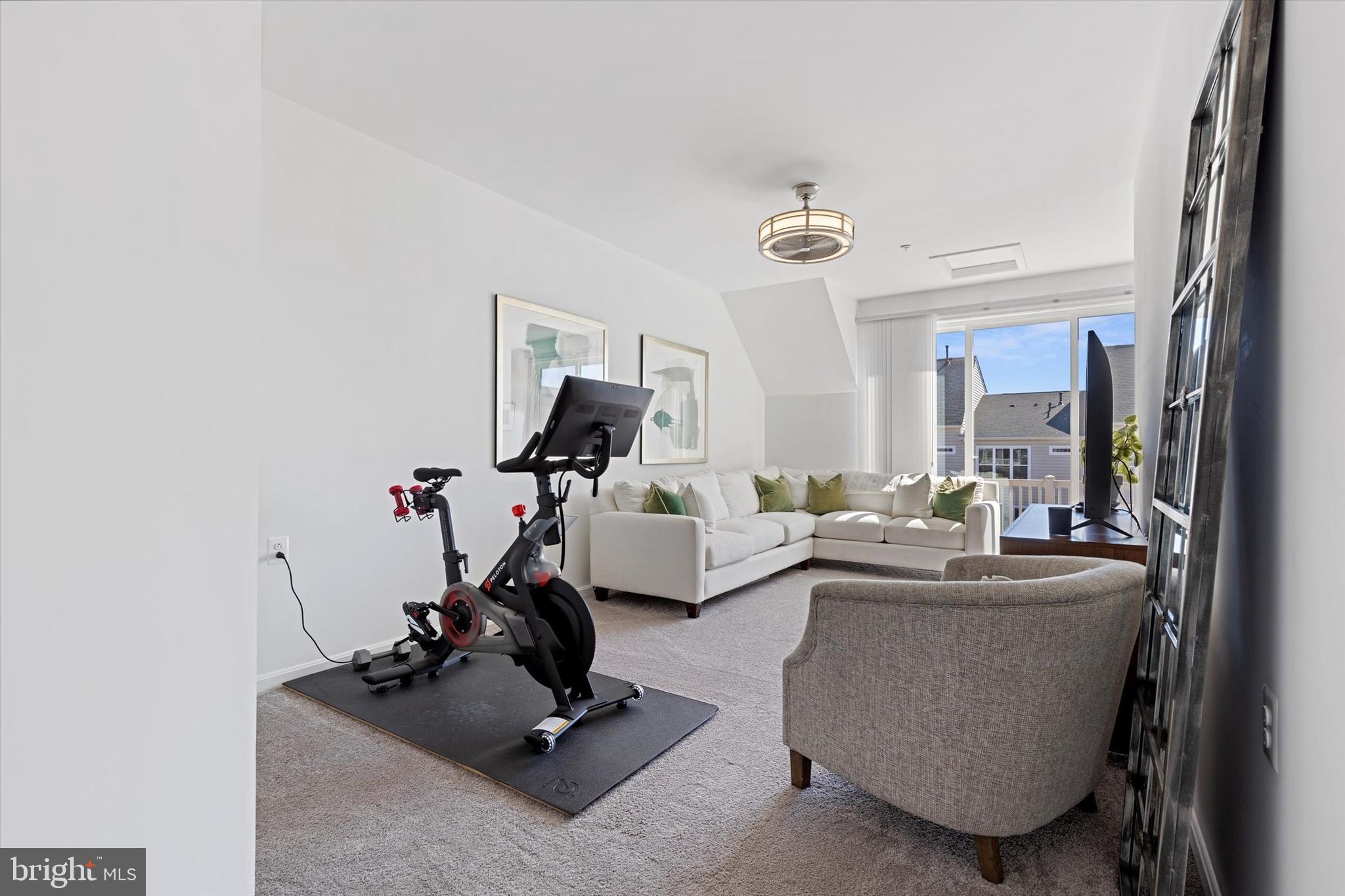 924 Lindley Road Frederick, MD 21701 - Photo 23 of 46 a room with gym equipment and a large window