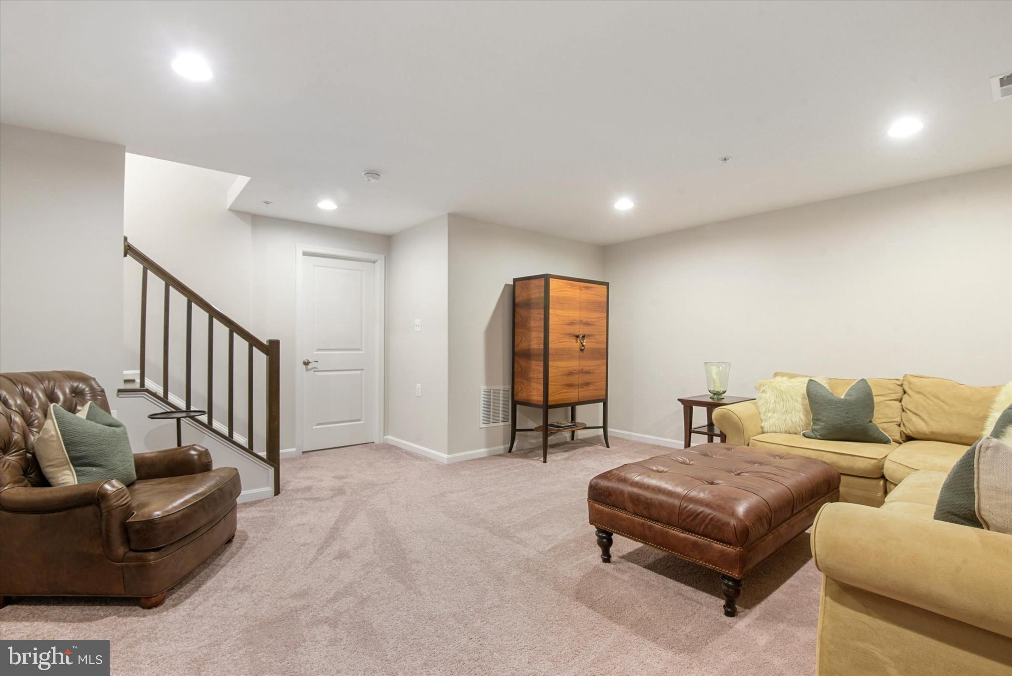 924 Lindley Road Frederick, MD 21701 - Photo 27 of 46 a living room with furniture and a ceiling fan