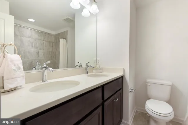 a view of a balcony with wooden fence