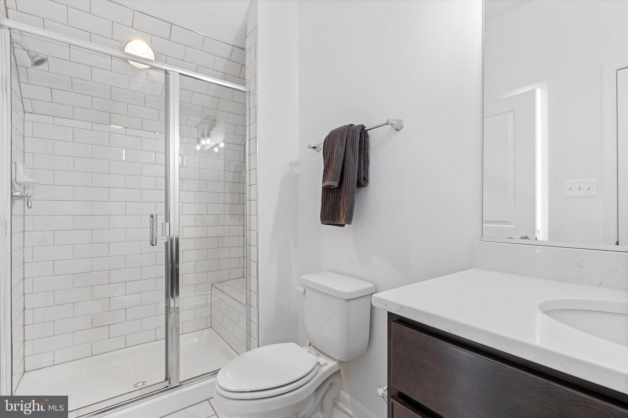 924 Lindley Road Frederick, MD 21701 - Photo 31 of 46 a bathroom with a sink a toilet and shower