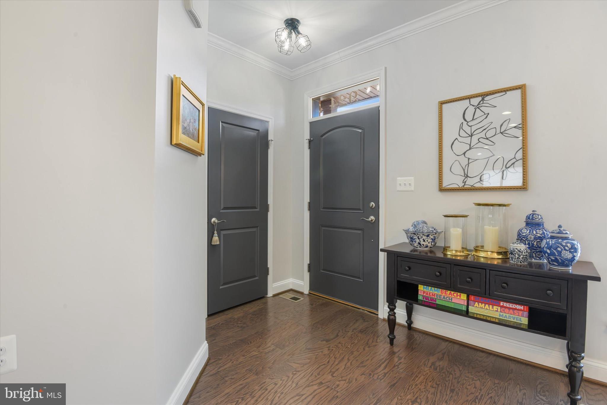 924 Lindley Road Frederick, MD 21701 - Photo 4 of 46 a room with furniture and wooden floor