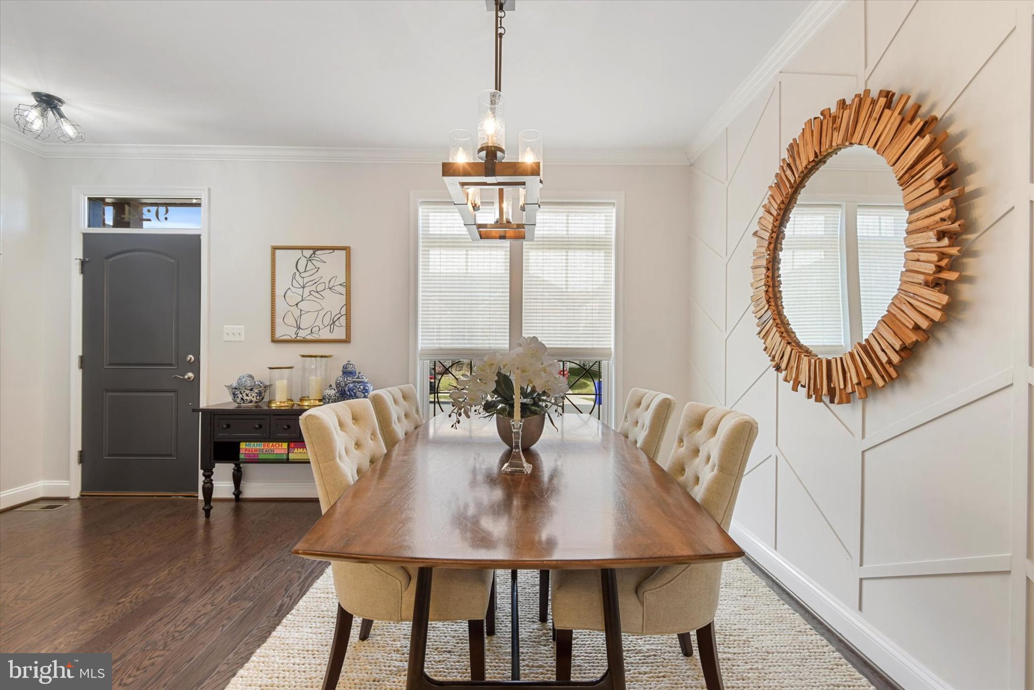 924 Lindley Road Frederick, MD 21701 - Photo 5 of 46 a view of a dining room with furniture window and wooden floor