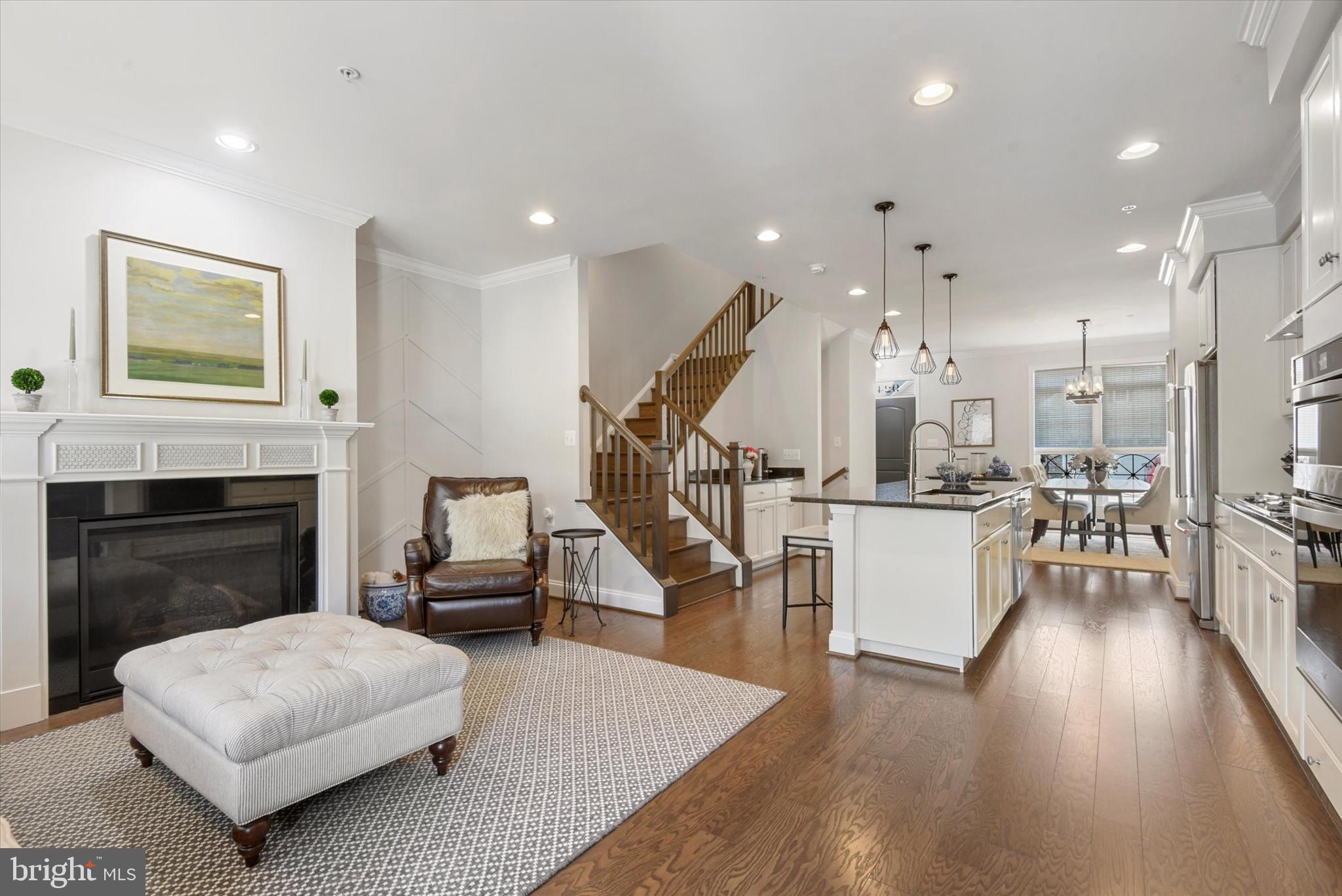 924 Lindley Road Frederick, MD 21701 - Photo 10 of 46 a living room with furniture and a fireplace