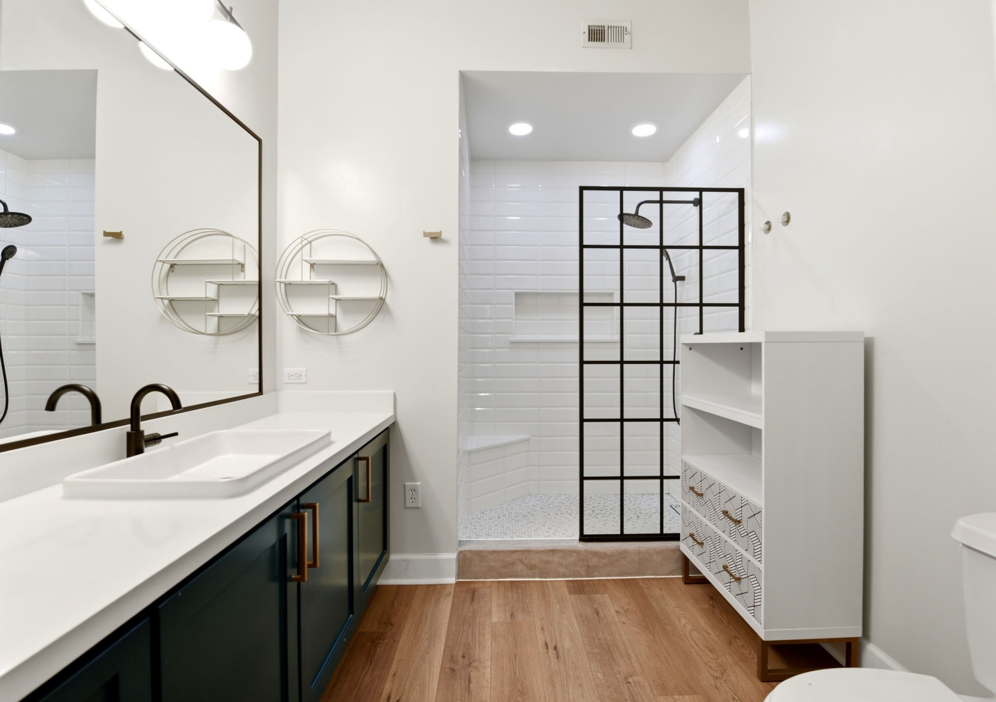 1010 Rosine Street, Unit 43 Houston, TX 77019 - Photo 33 of 48 a bathroom with a sink and a mirror