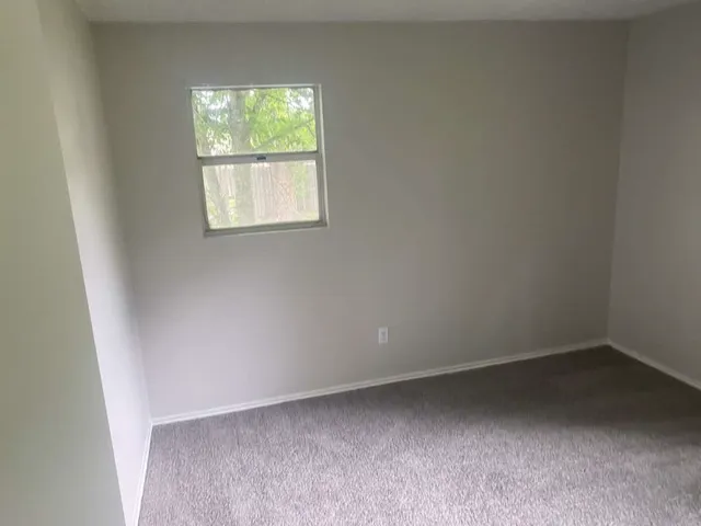 an empty room with a door