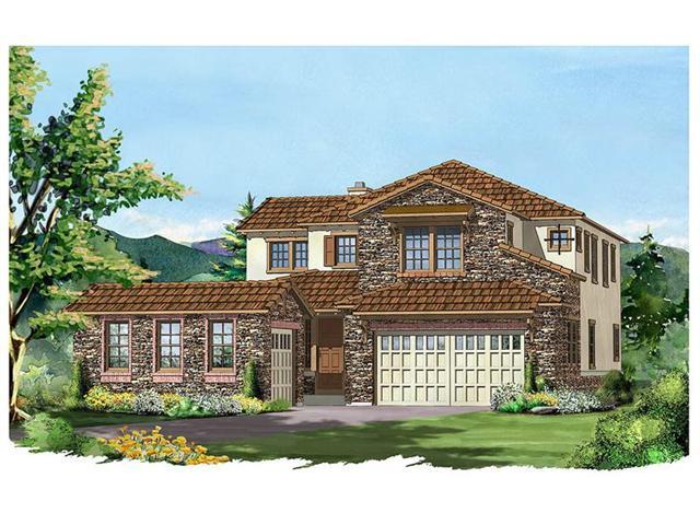 10729 Sundial Rim Road Highlands Ranch, CO 80126 - Photo 1 of 1 a front view of a house with a garden