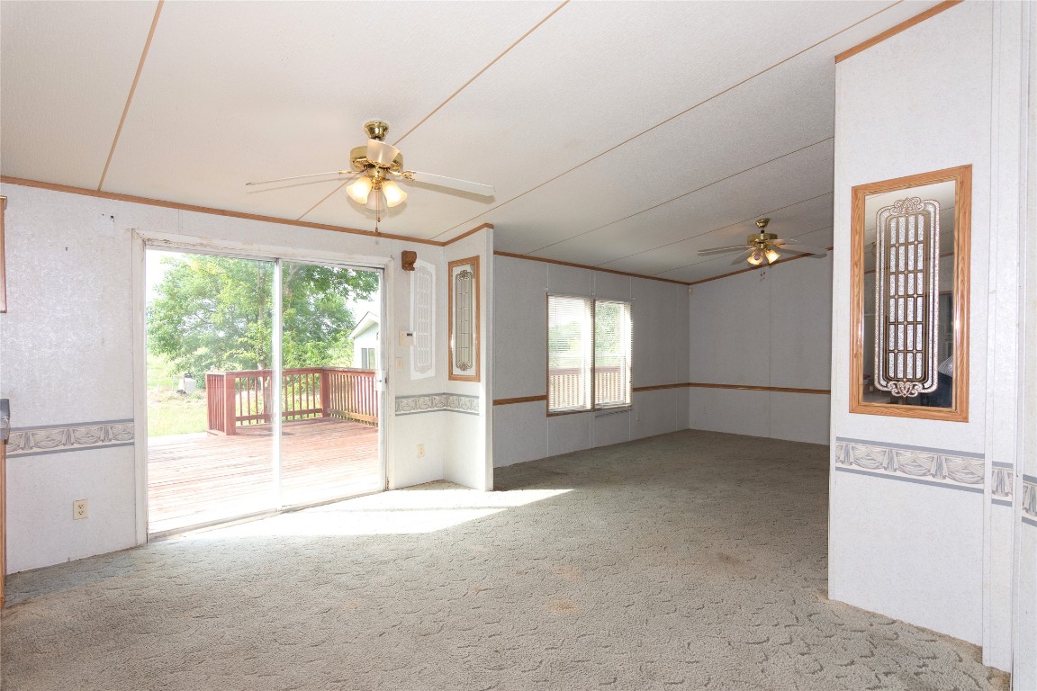 1 11209-tract Road Del Valle, TX 78617 - Photo 12 of 39 a view of an empty room with a window