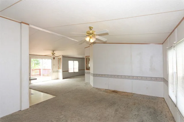 a kitchen with stainless steel appliances granite countertop a stove a sink dishwasher and a refrigerator