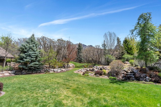 811 South High Ridge Drive Alpine, UT 84004 - Photo 62 of 98 View of green lawn featuring a mountain view