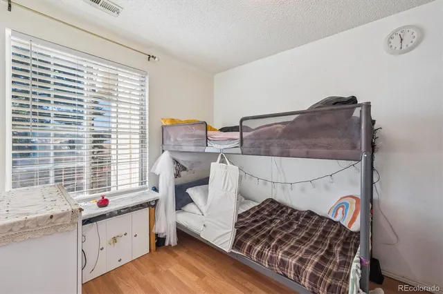 a view of a balcony with chairs